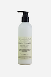 Hvid flaske Munkholm Conditioner med sort pumpe. Indeholder Rosentræ, Argan, Hvede Protein.