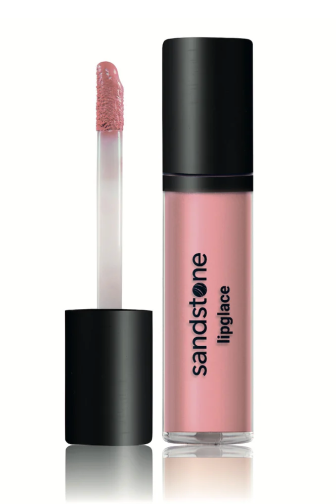 Klar tube med sort låg, pink lipgloss og applikator. Produktnavn: Sandstone - Lipglace - Skinny dip.