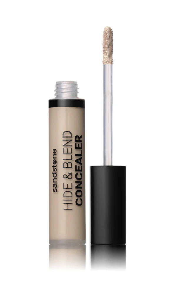 Sandstone concealer med lys beige farve, cylinderformet beholder og indbygget applikator.