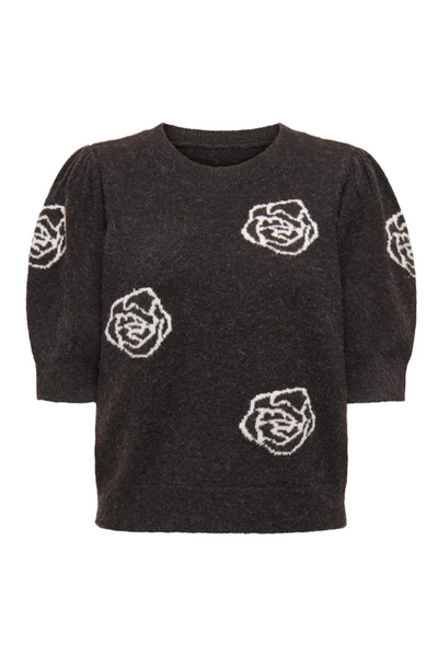 Pullover med rund hals, hvidt blomstermønster, korte pufærmer i sort farve.